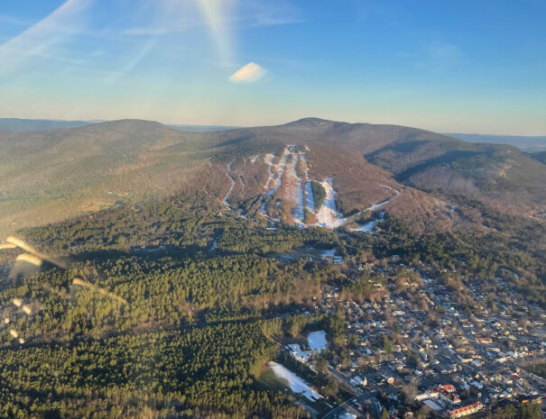 Winter scenic flight over Mount Cranmore, North Conway, New Hampshire, Mount Washington Valley